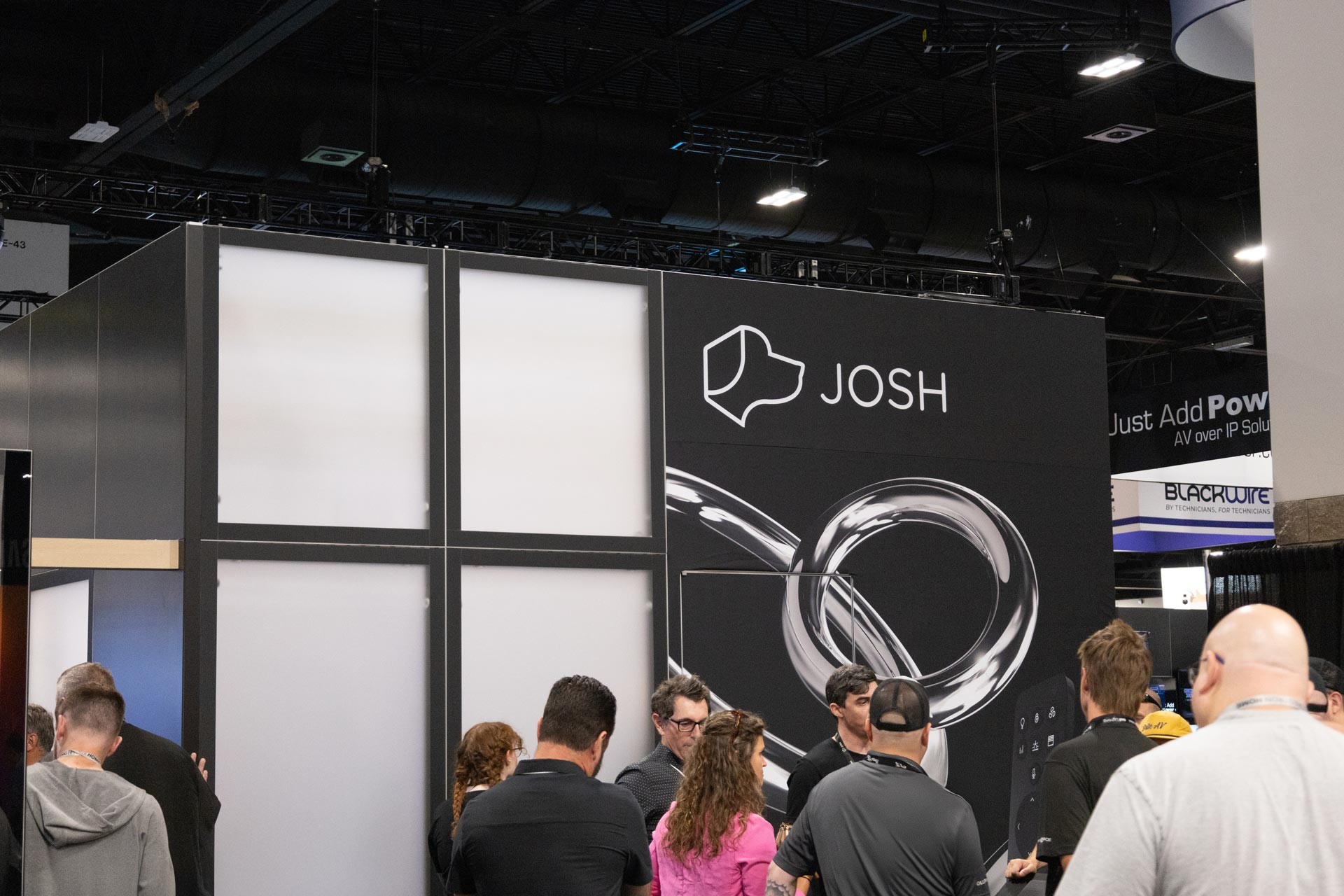 Anders brand wordmark in white placed on top of an image of a modern interior design.